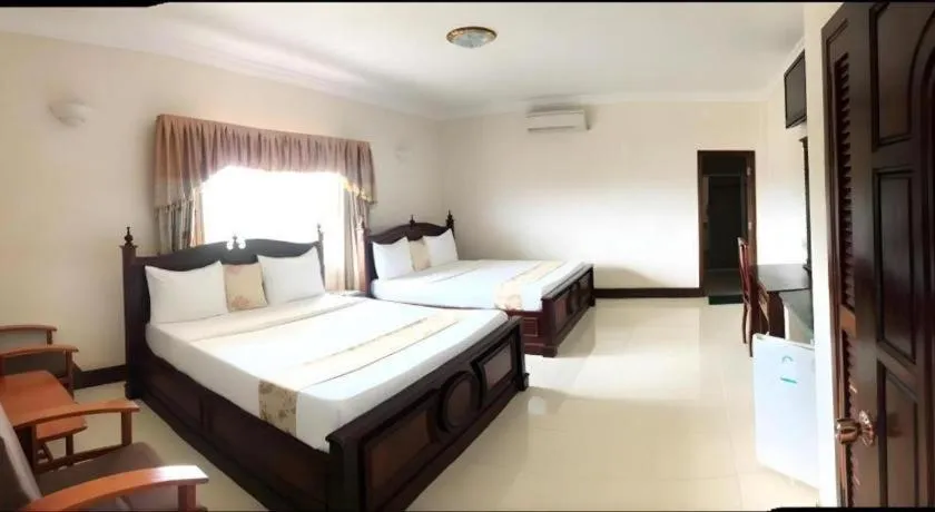 Bed in Asian Koh Kong Hotel