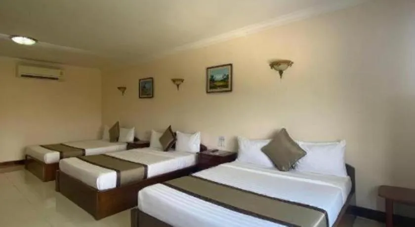 Bed in Asian Koh Kong Hotel