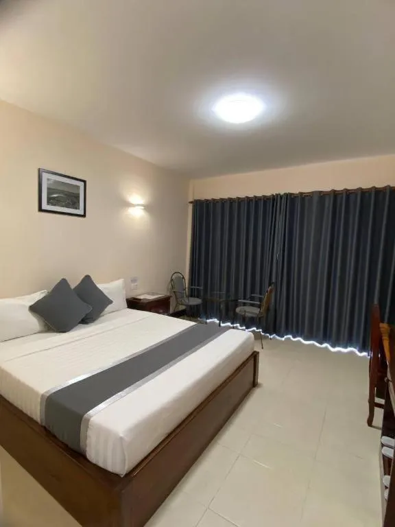 Bed in Asian Koh Kong Hotel