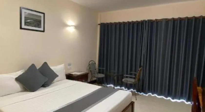 Bed in Asian Koh Kong Hotel