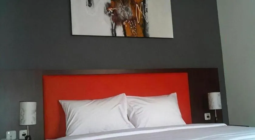 Bed in Sarila Hotel Solo