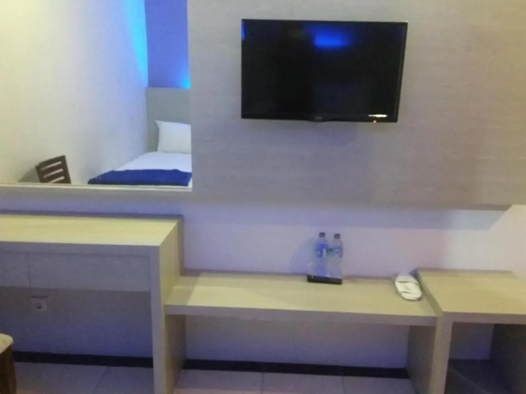 Bed in Kharisma Hotel