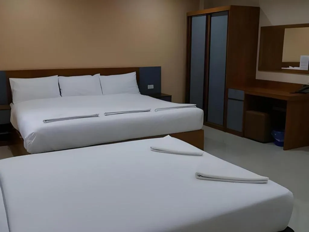 Bed in Regent Room Hotel