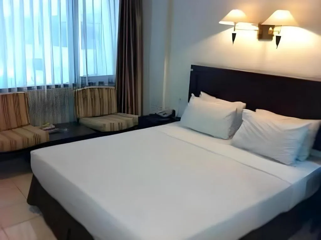 Bed in Guntur Hotel