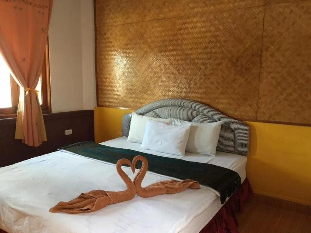 Bed in Sritrang Hotel