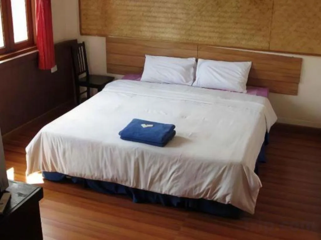 Bed in Sritrang Hotel