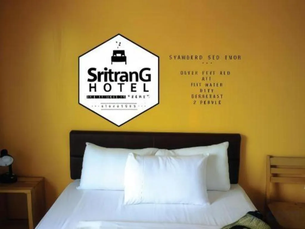 Bed in Sritrang Hotel