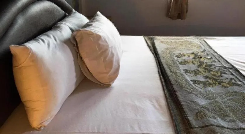 Bed in Sritrang Hotel