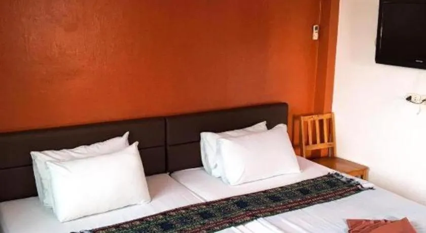 Bed in Sritrang Hotel