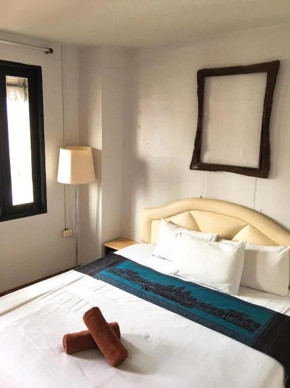 Bed in Sritrang Hotel