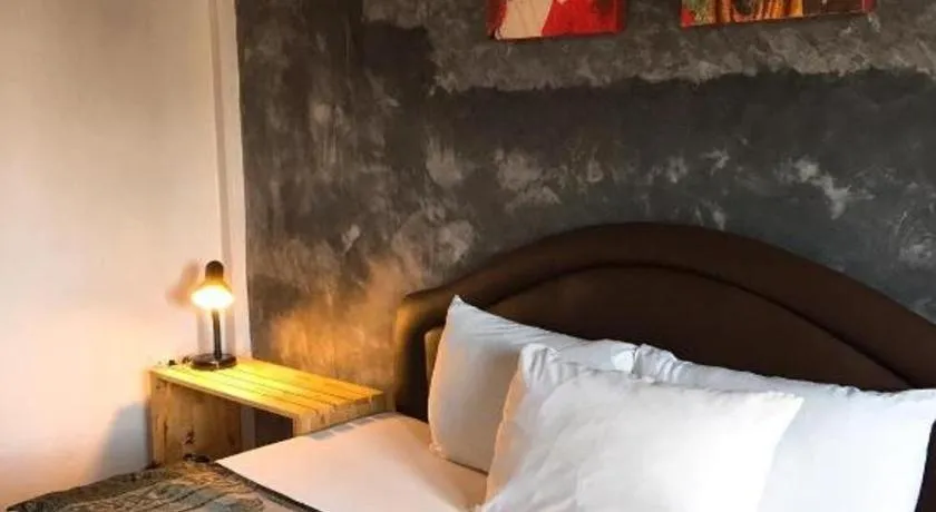 Bed in Sritrang Hotel