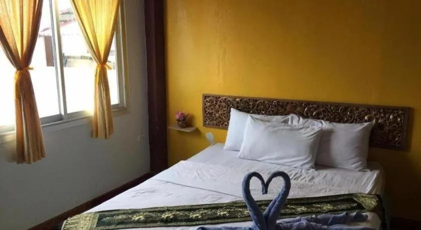 Bed in Sritrang Hotel