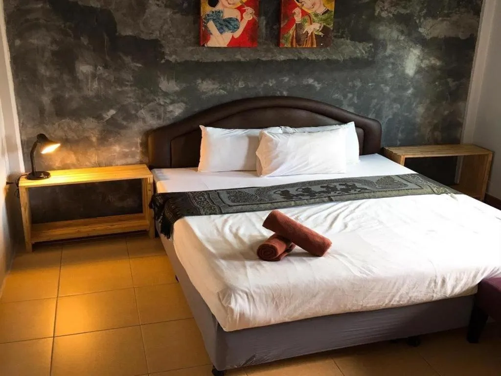 Bed in Sritrang Hotel