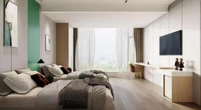 Bed in Yiwu Bairui Grand Hotel