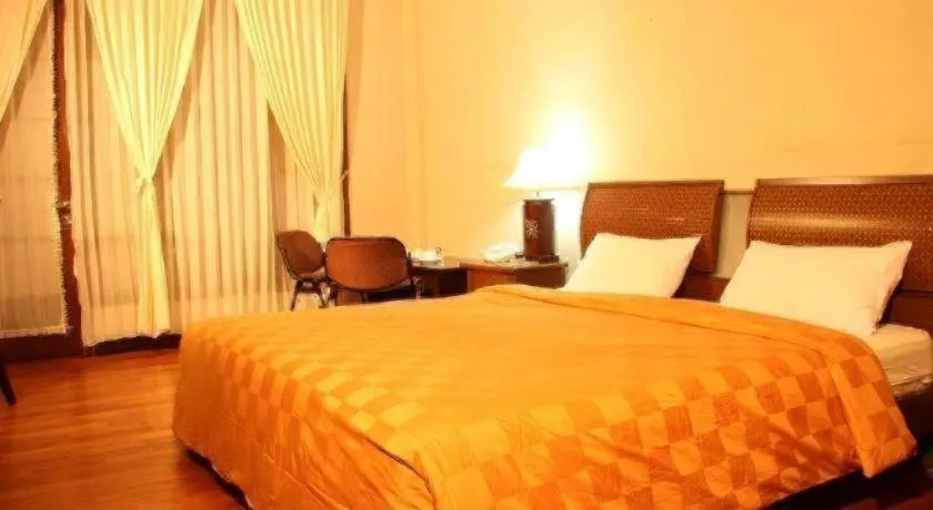 Bed in Campago Resort Hotel