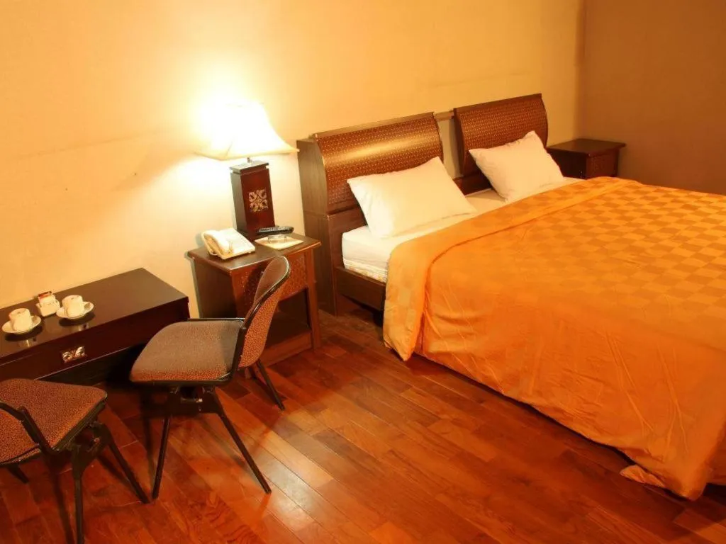 Bed in Campago Resort Hotel