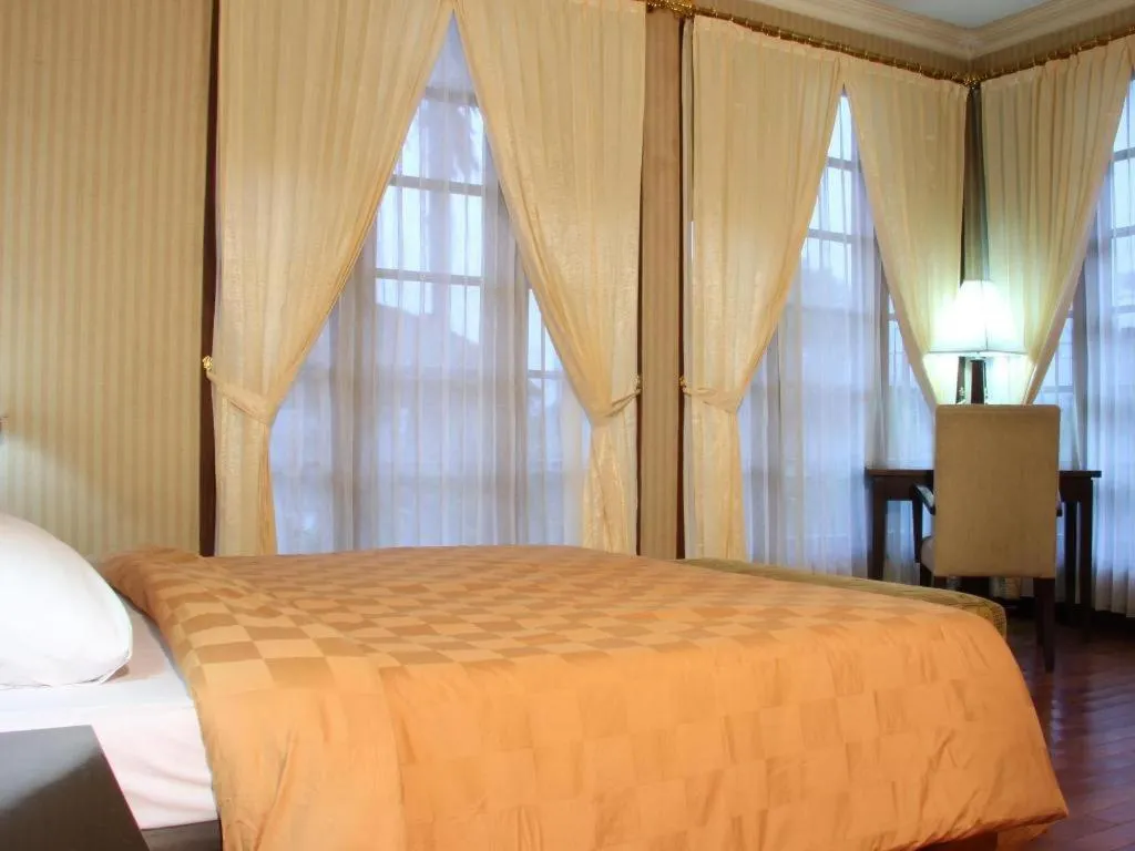 Bed in Campago Resort Hotel