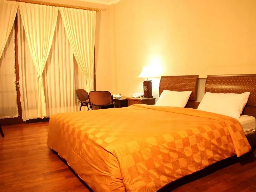 Bed in Campago Resort Hotel