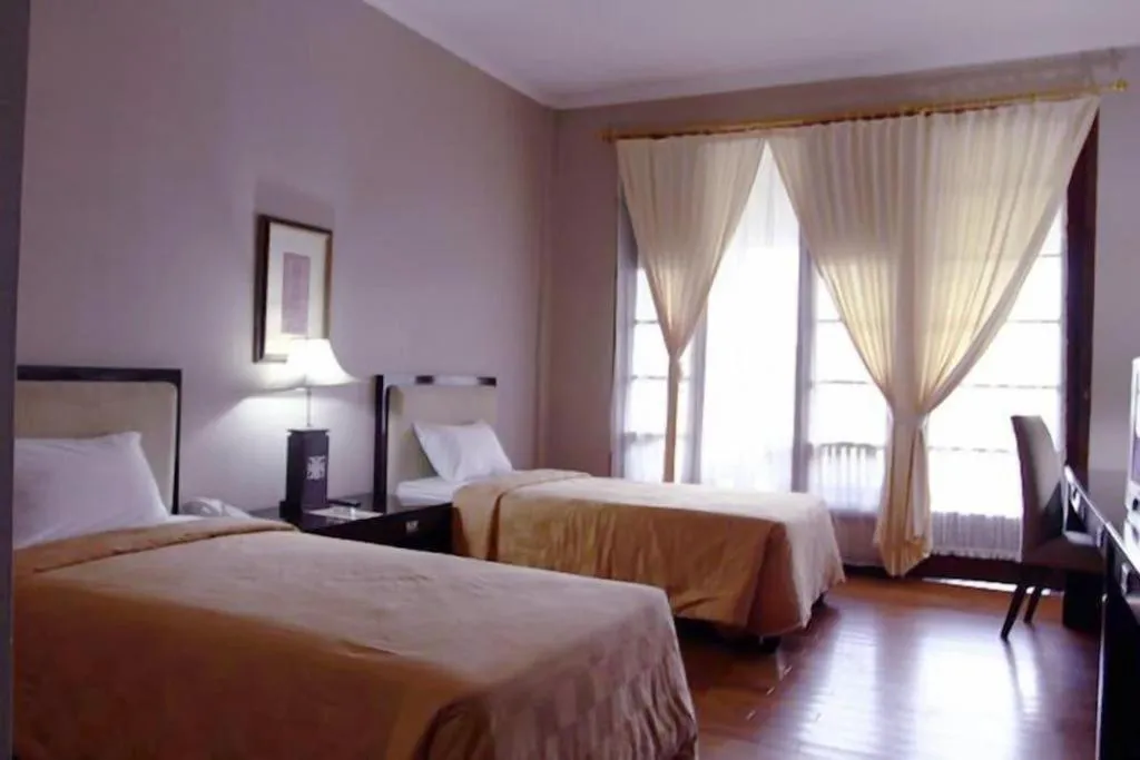 Bed in Campago Resort Hotel