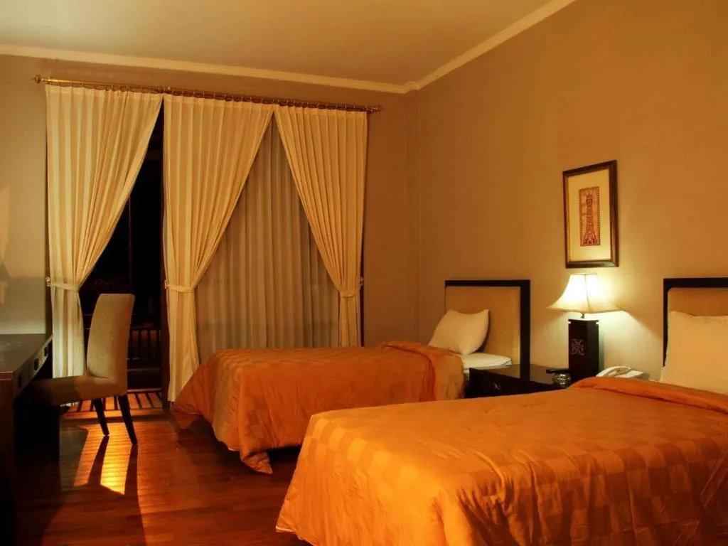 Bed in Campago Resort Hotel