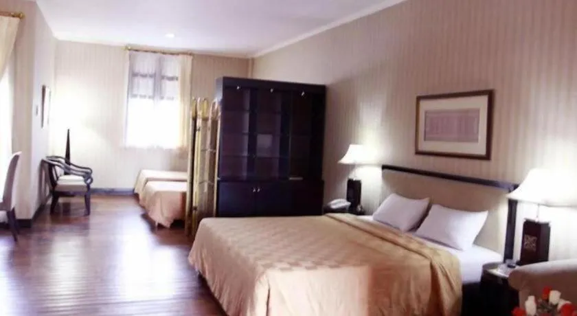 Bed in Campago Resort Hotel