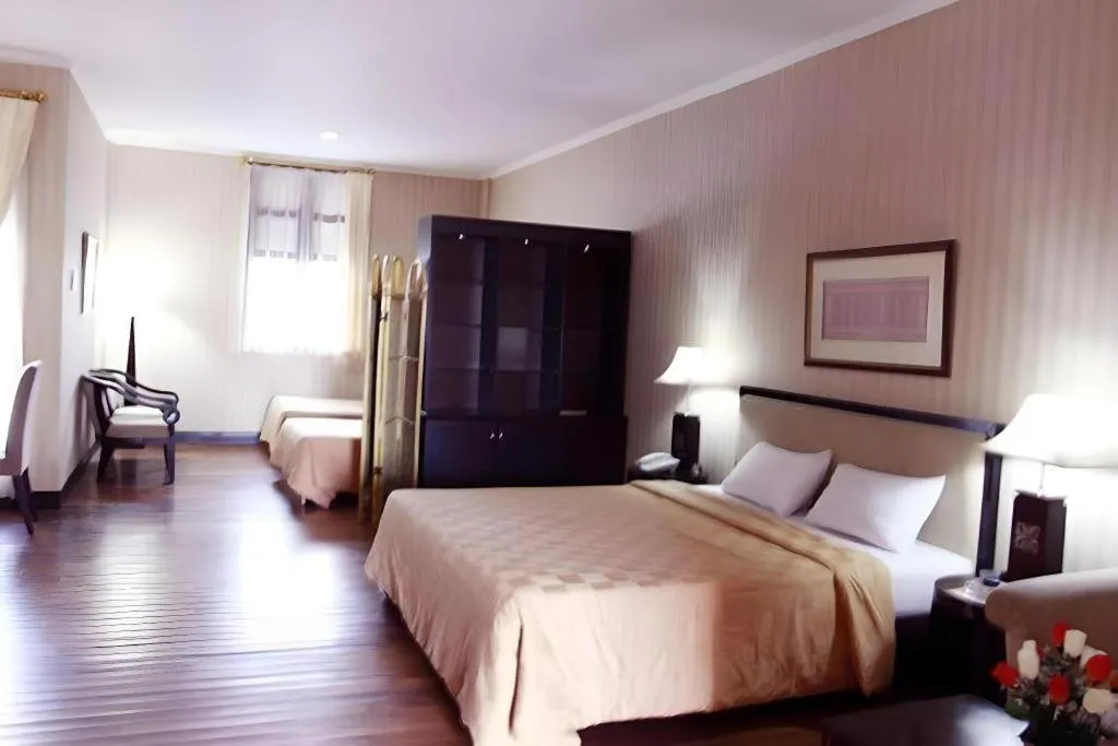 Bed in Campago Resort Hotel