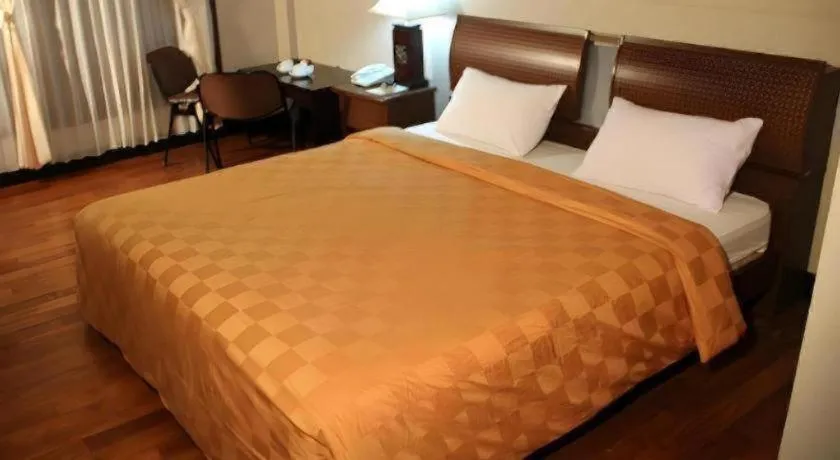 Bed in Campago Resort Hotel