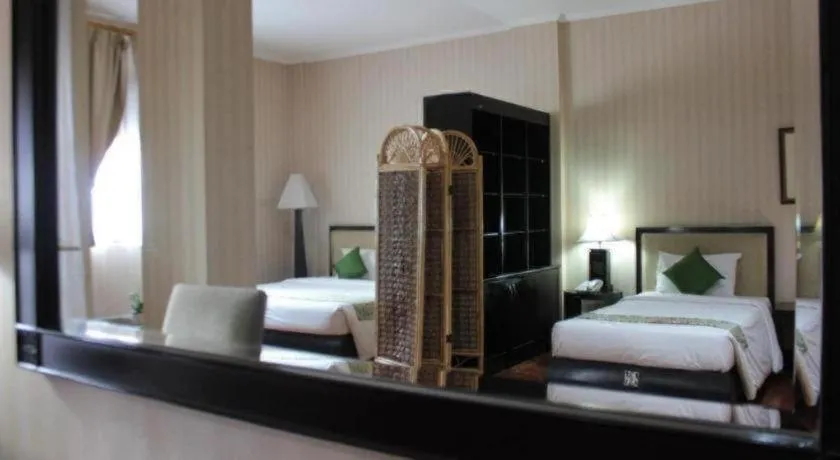 Bed in Campago Resort Hotel