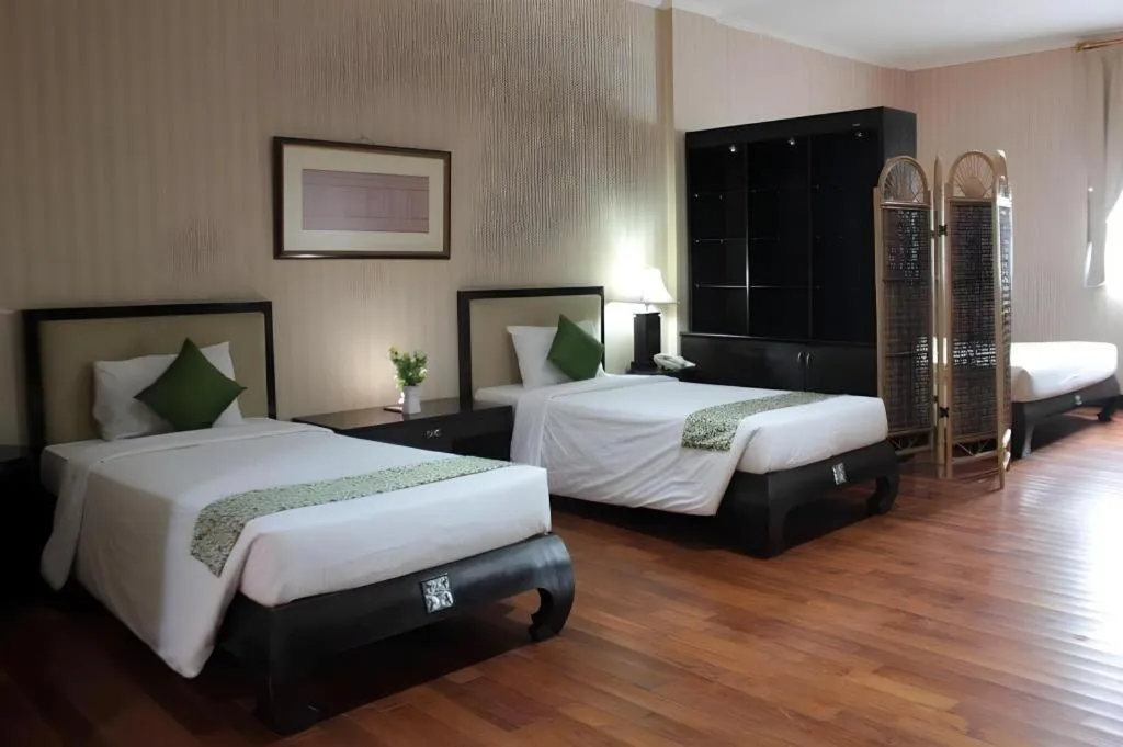 Bed in Campago Resort Hotel