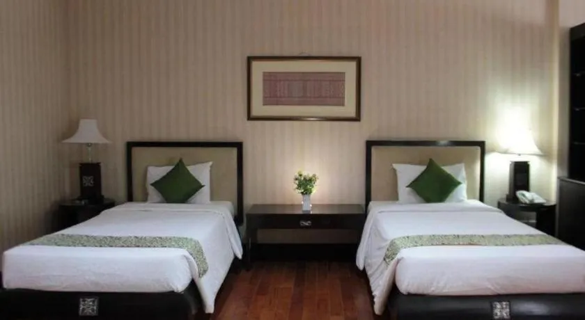 Bed in Campago Resort Hotel