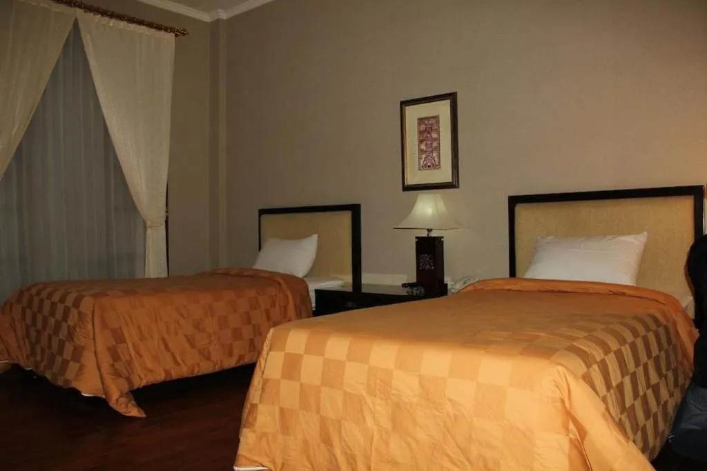 Bed in Campago Resort Hotel