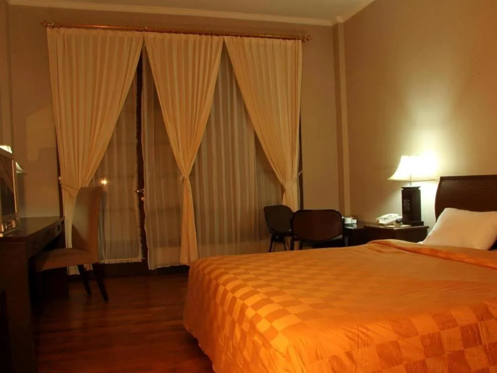 Bed in Campago Resort Hotel