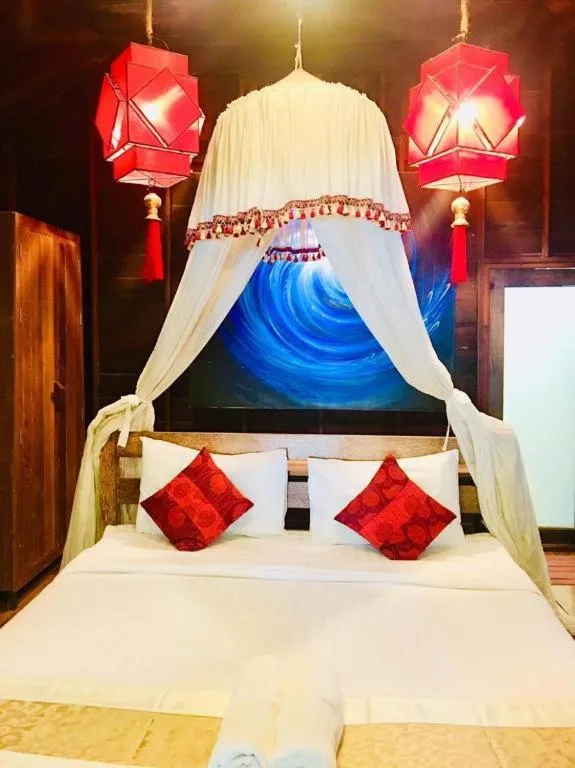Bed in Chivaree Hotel and Resort