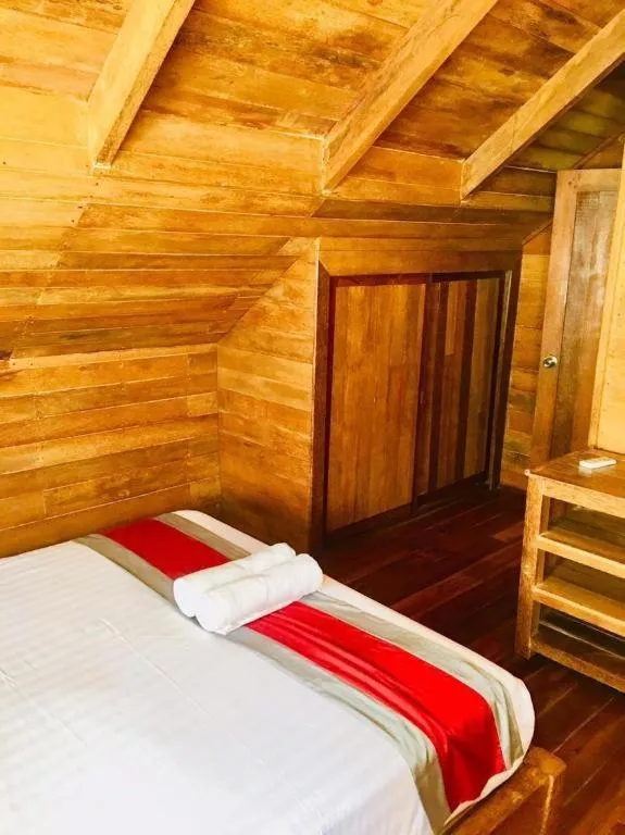 Bed in Chivaree Hotel and Resort