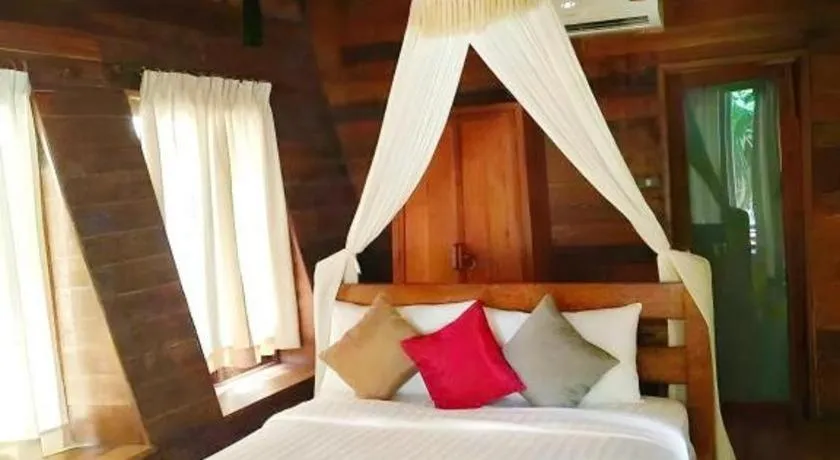 Bed in Chivaree Hotel and Resort