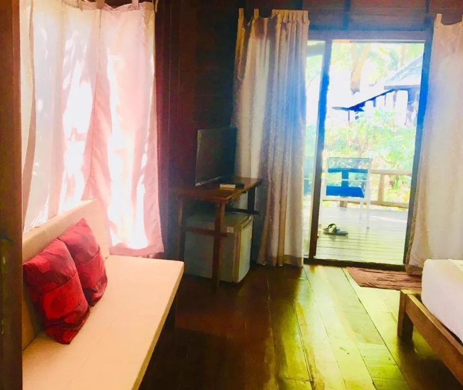 Bed in Chivaree Hotel and Resort