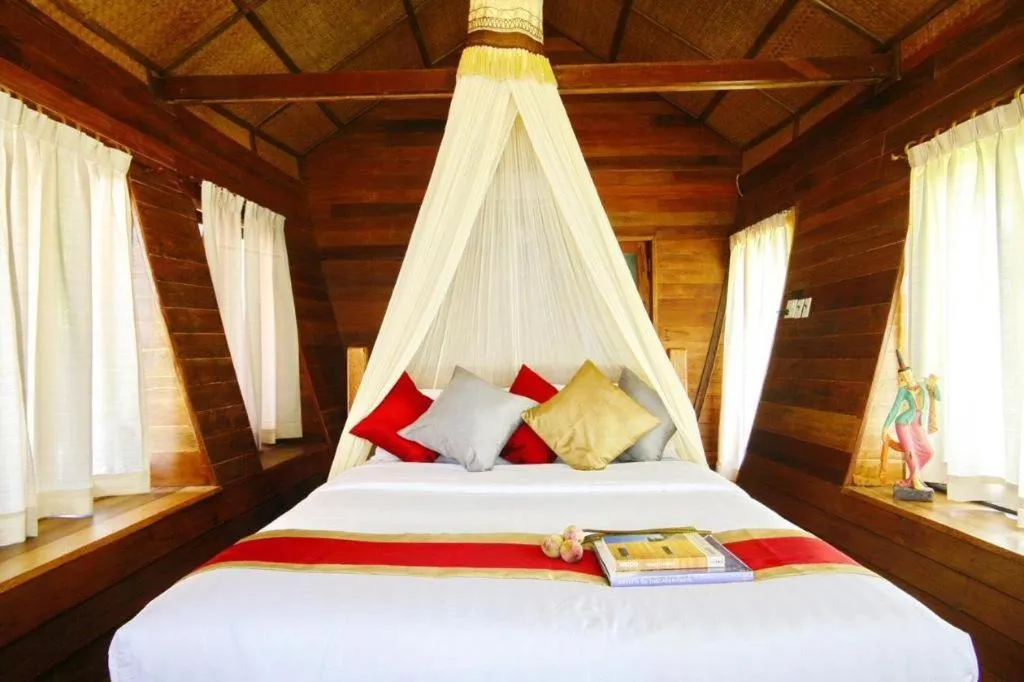 Bed in Chivaree Hotel and Resort