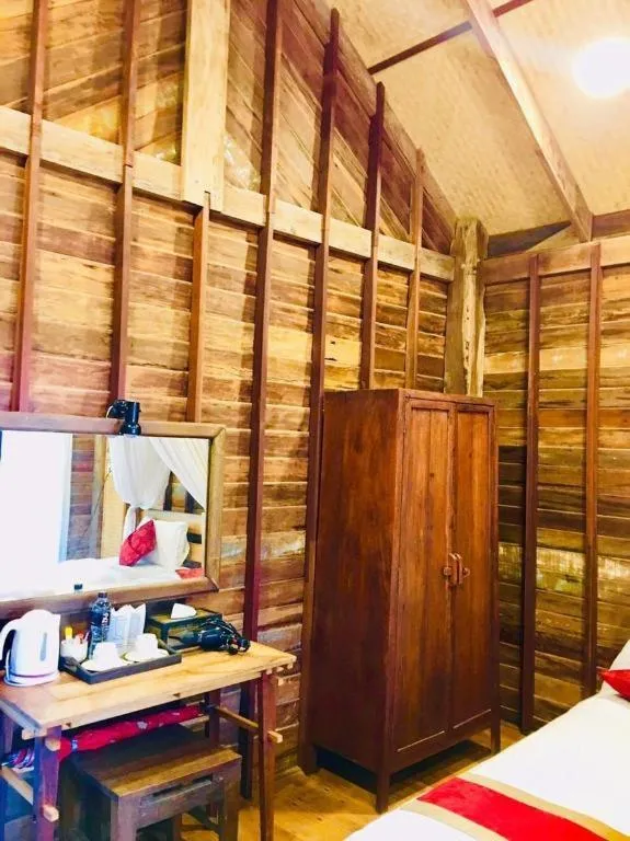 Bed in Chivaree Hotel and Resort