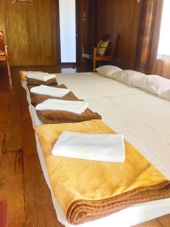 Bed in Chivaree Hotel and Resort