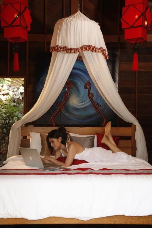Bed in Chivaree Hotel and Resort