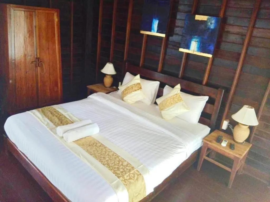 Bed in Chivaree Hotel and Resort