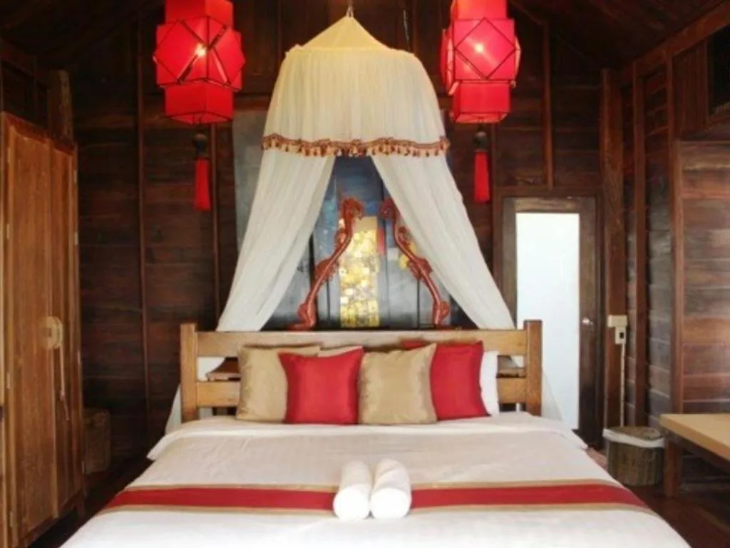 Bed in Chivaree Hotel and Resort
