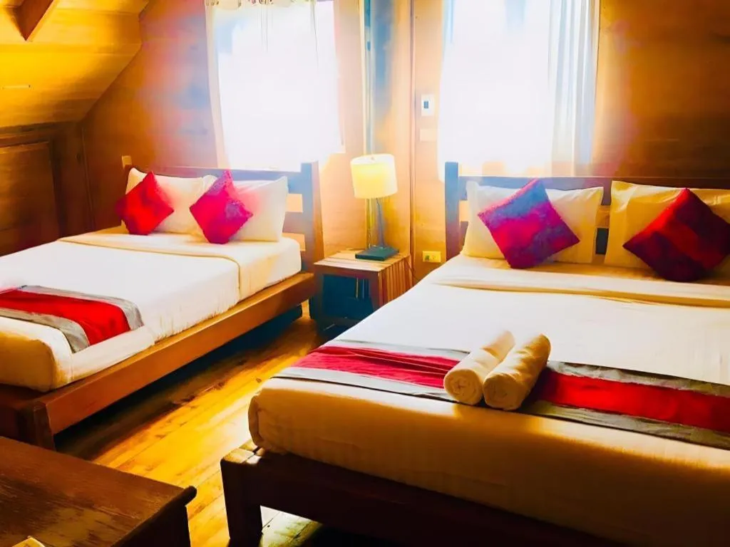 Bed in Chivaree Hotel and Resort