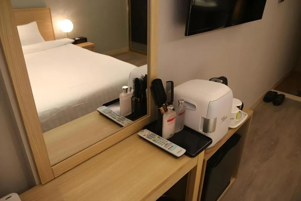 Bed in Jeju Sejong Hotel