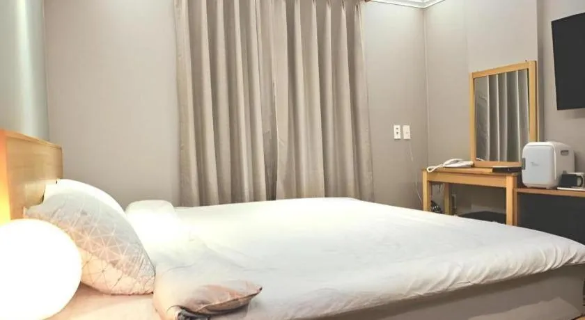 Bed in Jeju Sejong Hotel