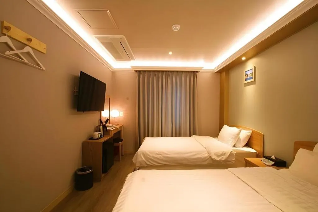 Bed in Jeju Sejong Hotel