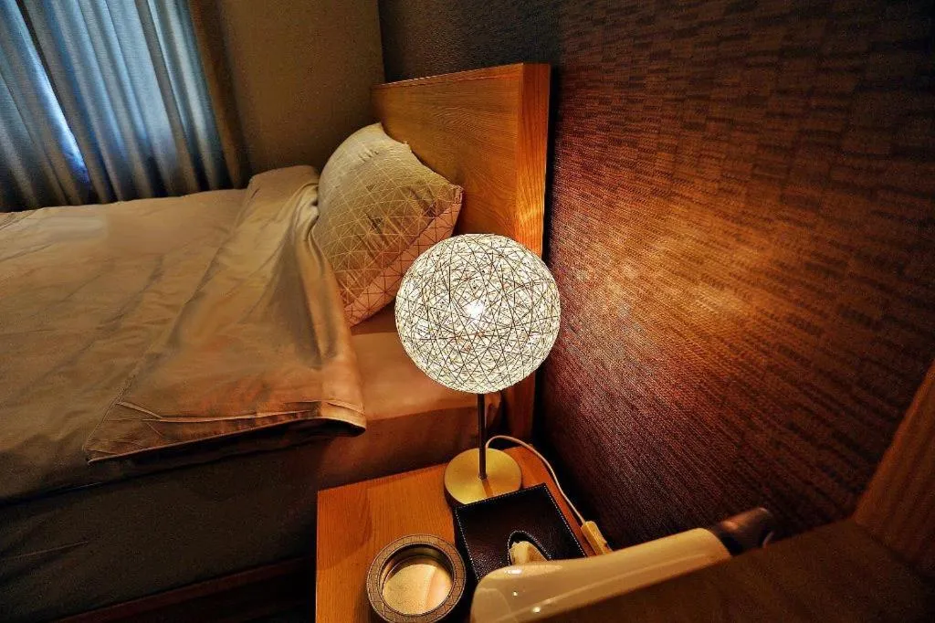 Bed in Jeju Sejong Hotel