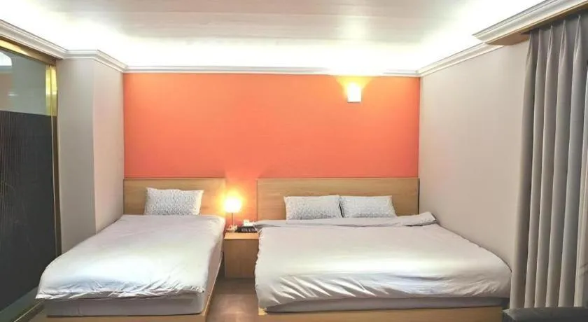 Bed in Jeju Sejong Hotel