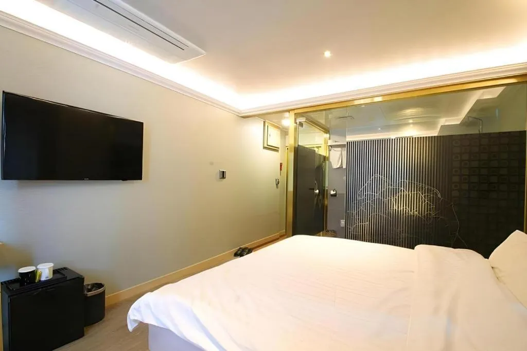 Bed in Jeju Sejong Hotel