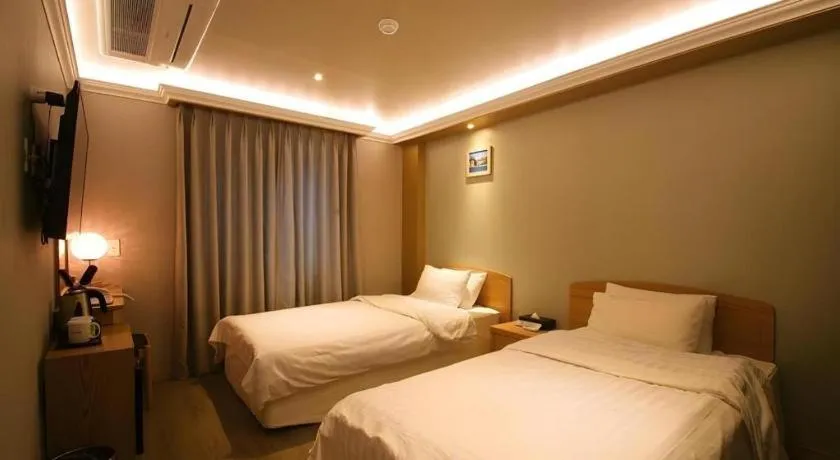 Bed in Jeju Sejong Hotel